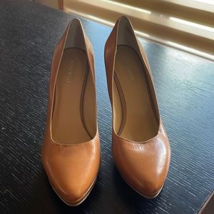 Nine West tan pumps. Only wore once.